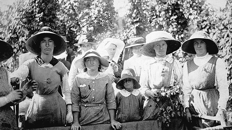 Black and white image of a group of women and girls