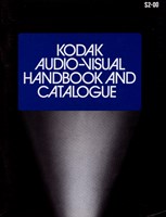 A catalogue with black front cover with white text in blue text box