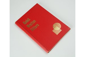 Red hardcover book with gold print on the front cover and down the spine