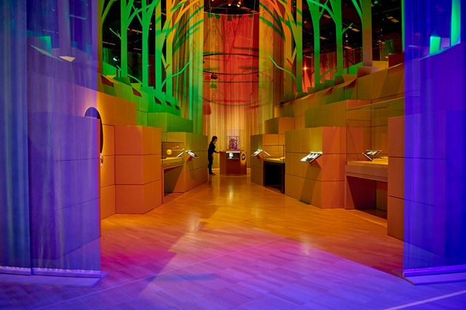 Interior of the exhibition with green and purple lighting 