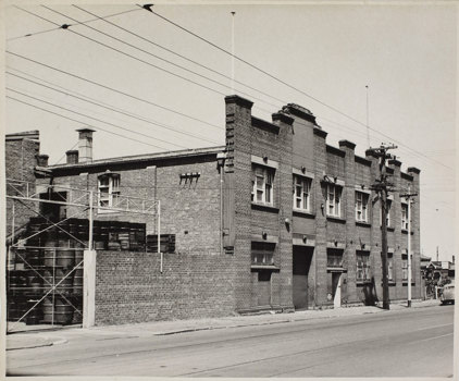 Black and white photograph of a brick building