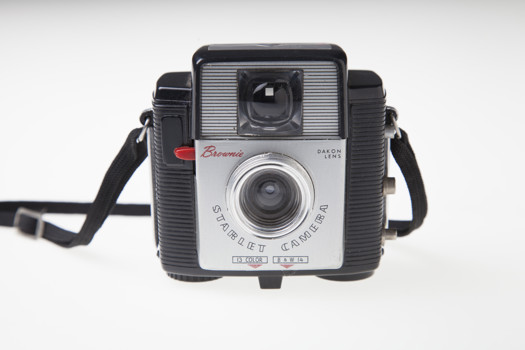 Fixed-focus grey plastic camera.
