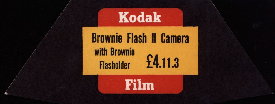 Black, red and yellow price ticket for a Brownie Flash II camera