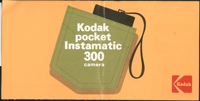 Yellow background with a Khaki green pocket with a black camera poking out of the top of the pocket. White text on the pocket says  'Kodak Pocket Instamatic 300 Camera'
