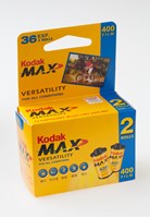 Small yellow box. Yellow, blue, red and black colour scheme. There is  a picture of film canister and a person riding a bike on the front