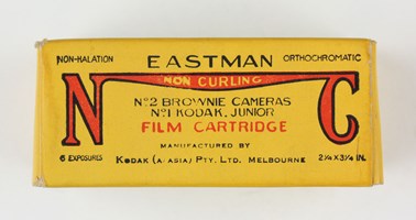 Yellow cardboard box; opened; printed in red and black colour scheme. 