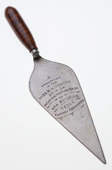 Engraved brick laying trowel