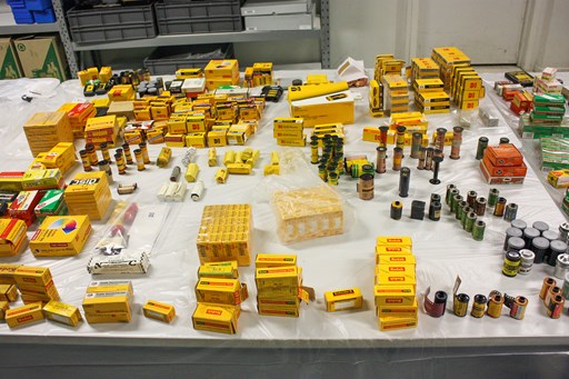 Rolls of film and film packaging laid out on a table
