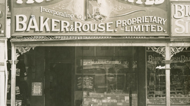Shopfront with large billboard on top of awning
