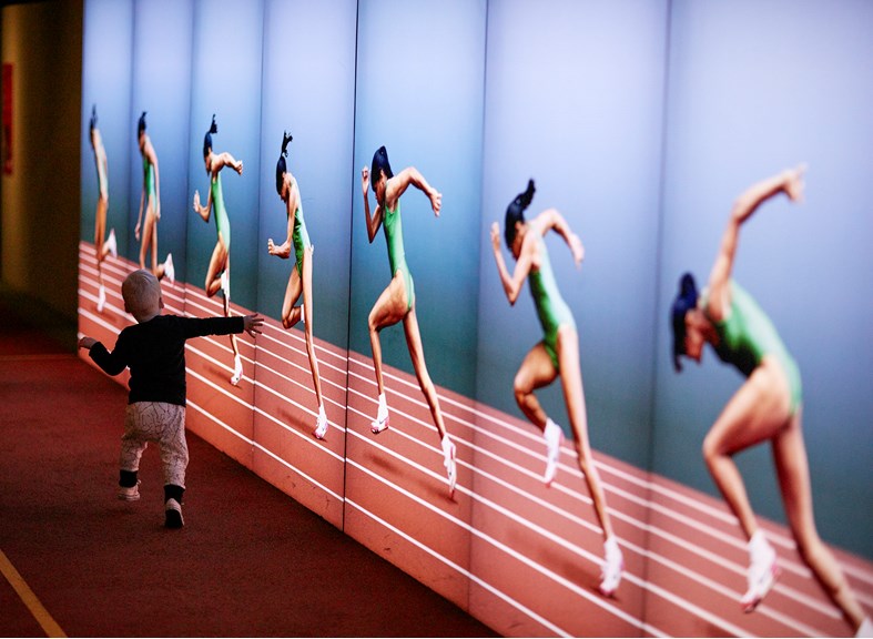 a toddler running alongside a series of images of a woman sprinting