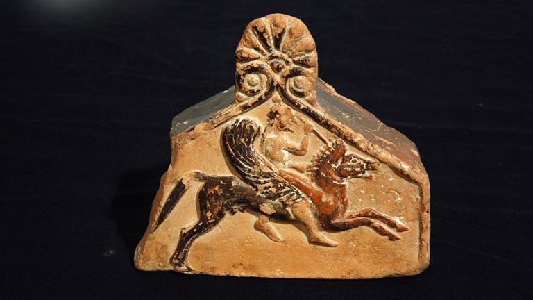 Carved image of Bellerophon mounting his winged horse, Pegasus