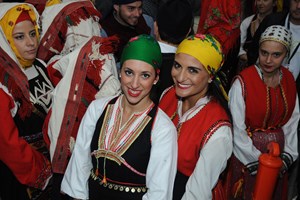 Two women wearing traditional regional costumes