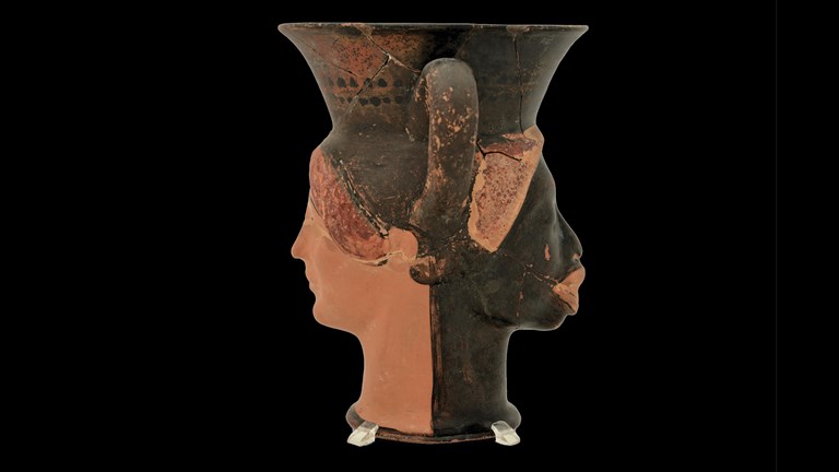 Terracotta vase shape as a woman's head