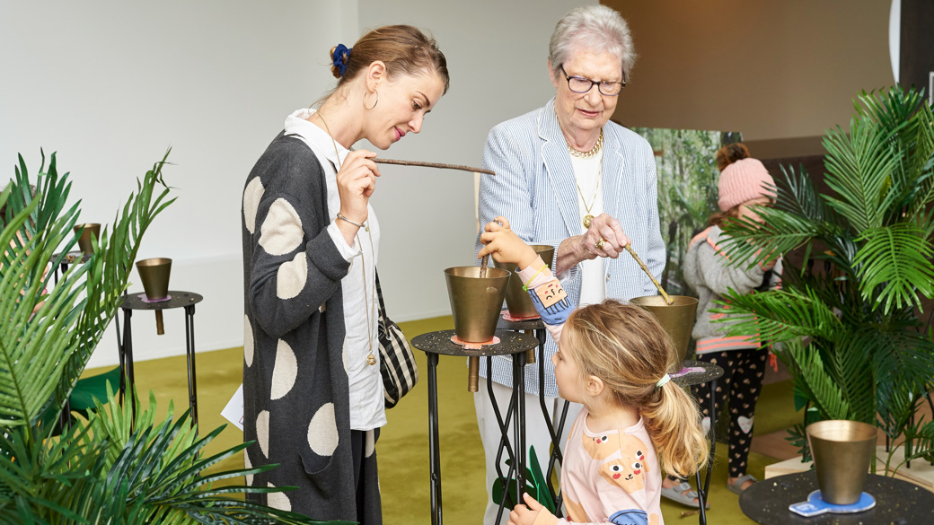 People playing the Federation Handbells at Music Play Family Festival, held at Melbourne Recital Centre
