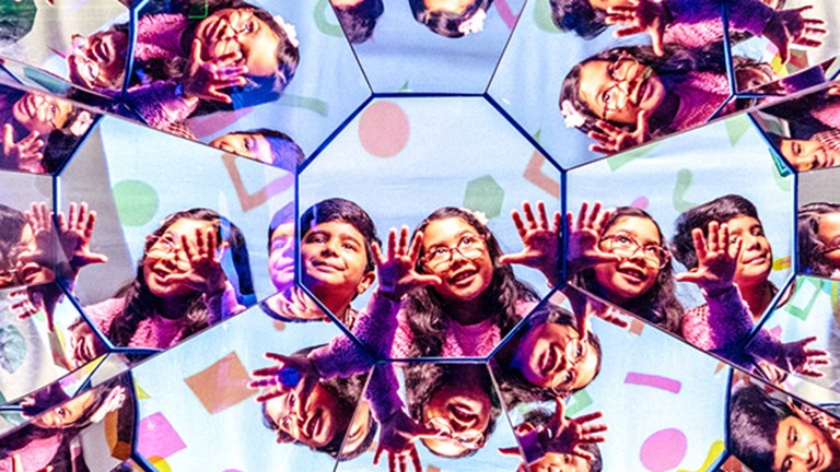 Two children in a kaleidoscope
