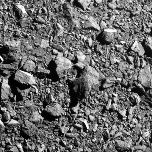 Grey rocky surface of an asteroid