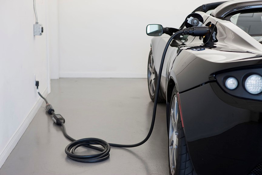 a car plugged into a wall charger
