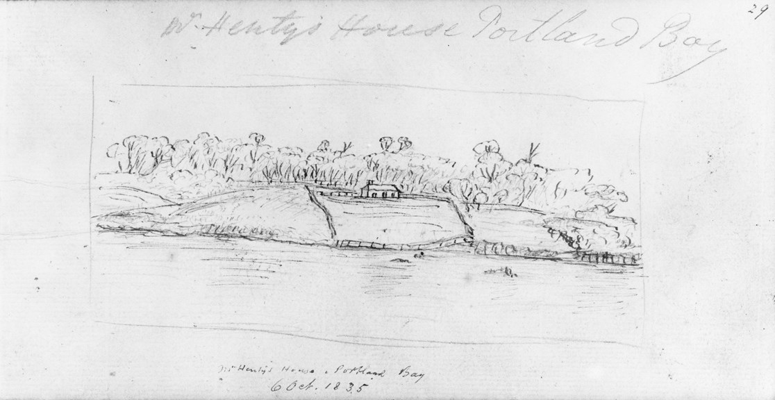 Sketch of a house with trees behind it and a fenced-off front yard and bay in front of it