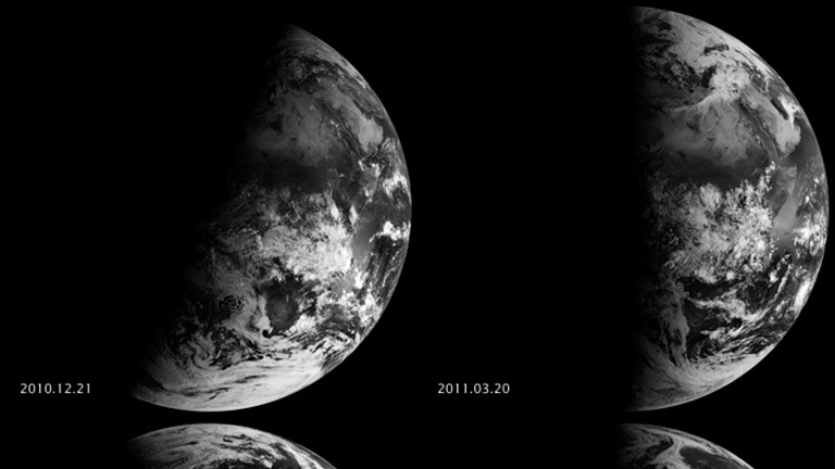 Four views of the Earth, each with half of the planet shrouded in darkness.