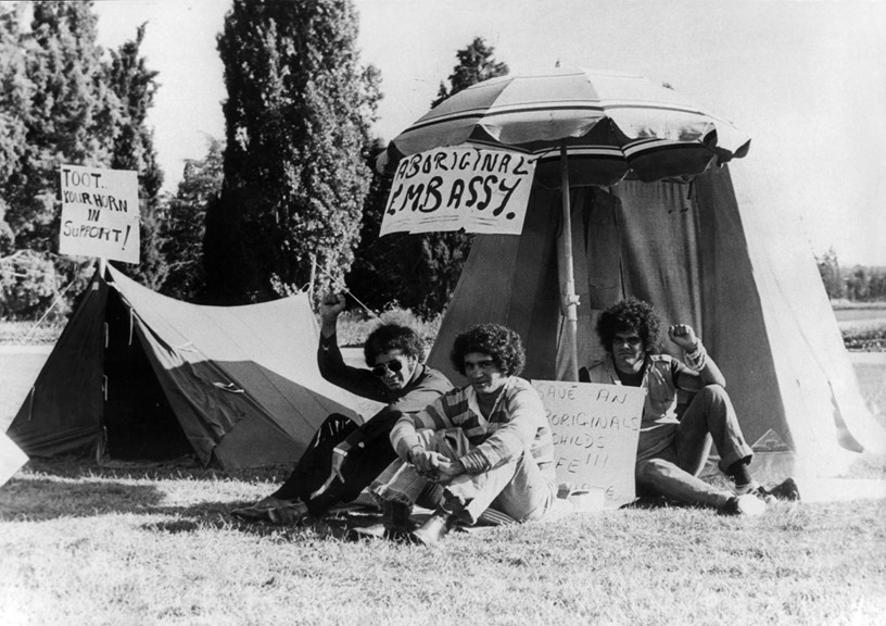 Aboriginal Tent Embassy, seated Mike Anderson, Billie Craig and Kevin Johnson, 27 January 1972. 