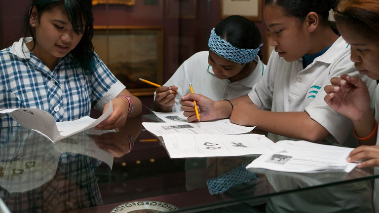 School students participating in an education program in the Greek Treasures exhibition at Immigration Museum