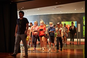 Primary school students entering First People exhibition for the 'Our Shared History' program.
