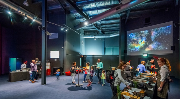 People in the planetarium foyer