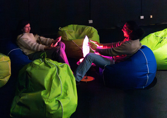 A lamp-light fireside beanbag catch-up at Scienceworks After Dark.