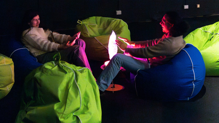 A lamp-light fireside beanbag catch-up at Scienceworks After Dark.