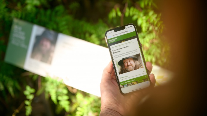 A mobile phone held in users hand.