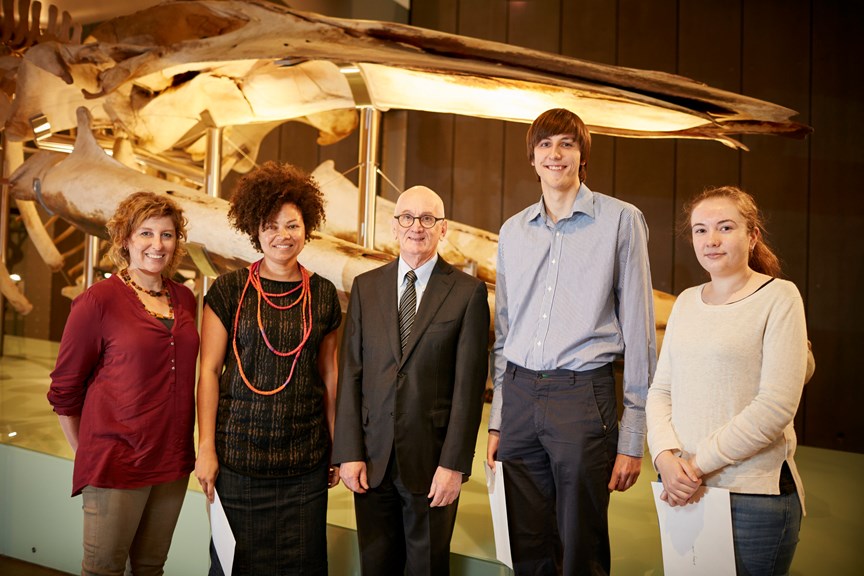 Dr Robin Hirst with the four recipients of the 1854 Student Scholarships for 2016, in front of the blue whale skeleton. 
