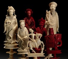 Chinese 'Cantonese Puzzle Ball' chess set carved from ivory, consisting of 15 white pieces,13 red pieces and various incomplete fragments.