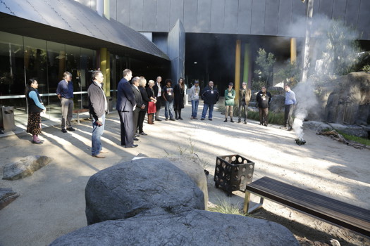 People gather in a semi circle