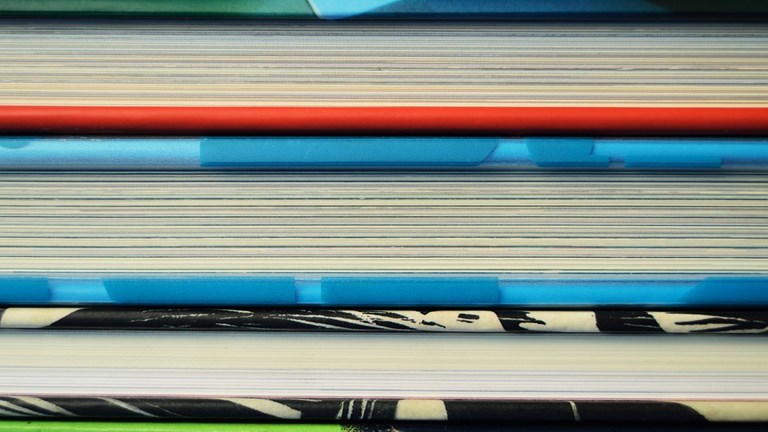 Close up of a stack of books