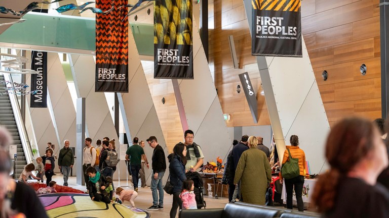 First Peoples banners hang in the Main Foyer area of Melbourne Museum.