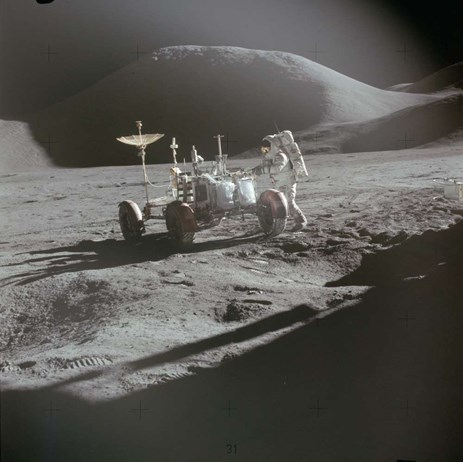 Man and vehicle on the Moon