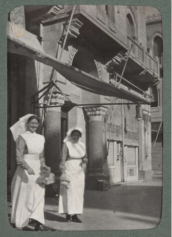 two nurses in the street