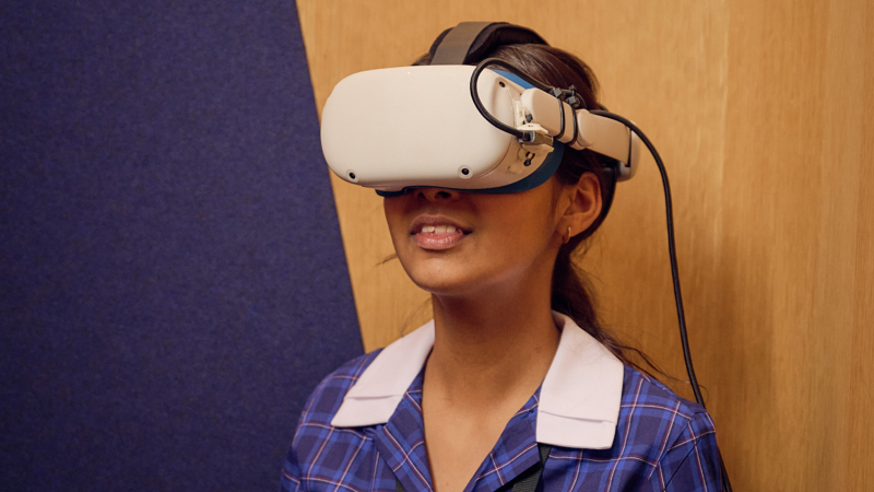 A student in the Road to Zero Learning Studio wearing a virtual reality headset 