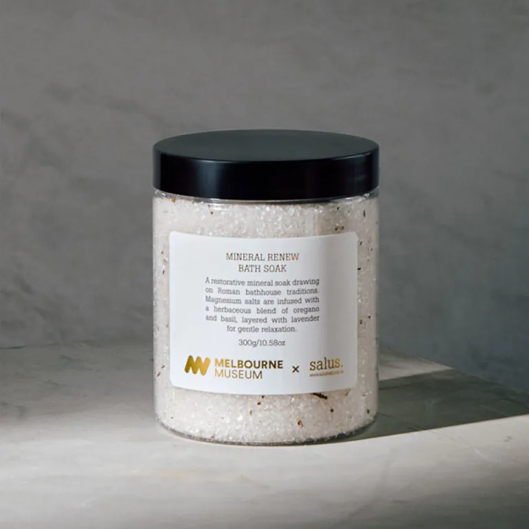 Clear jar of bath salts, the label is text only