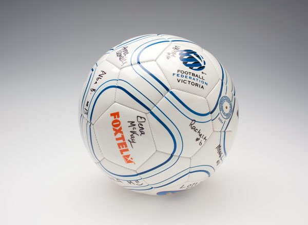 A leather soccer ball with signatures
