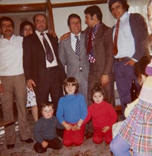 Group portrait of three brothers with a judge from Hadchit, 1975. 