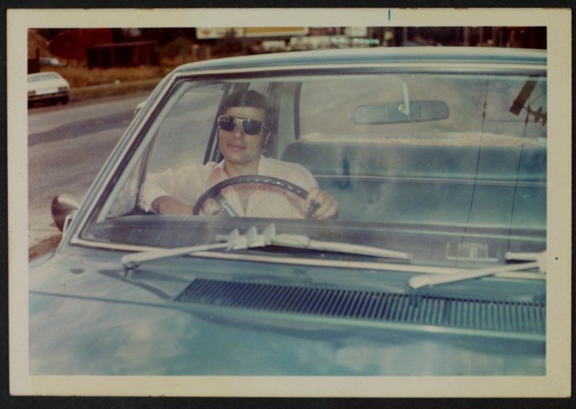 Portrait of a man at the wheel of a car, ca. 1972. 