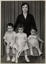 Portrait of a mother with her three children, ca. late 1960.