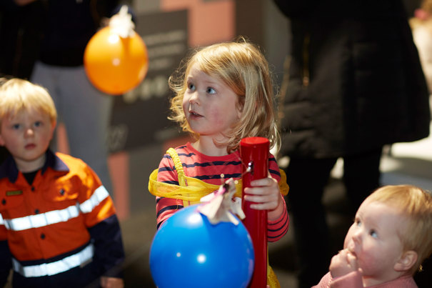  Children making balloon rockets during Little Kids' Day In: Let's Party! at Scienceworks.