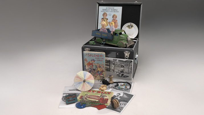 Various objects and props relating to childhood games used in reminiscing kit outreach programs