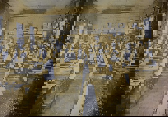 Old photograph of woodwork students in the classroom