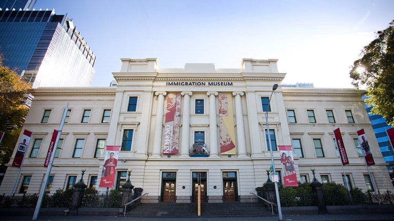 External view of Immgration Museum from Flinders Street in early evening.