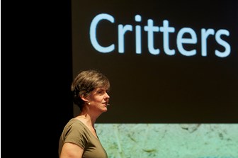 Curator of Herpetology Jane Melville presenting a talk at Melbourne Museum Theatre.