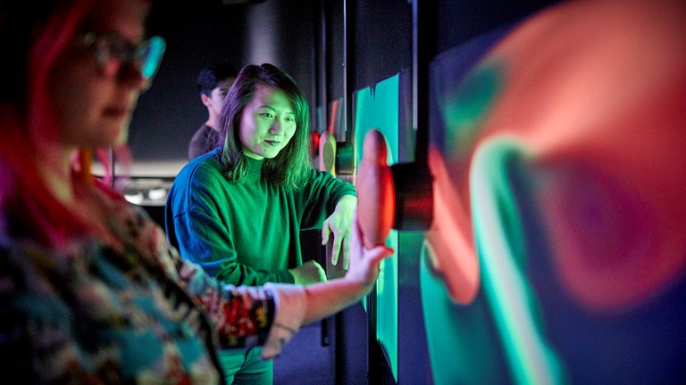 Visitors interact with Scienceworks exhibition "Beyond Perception: Seeing the Unseen".