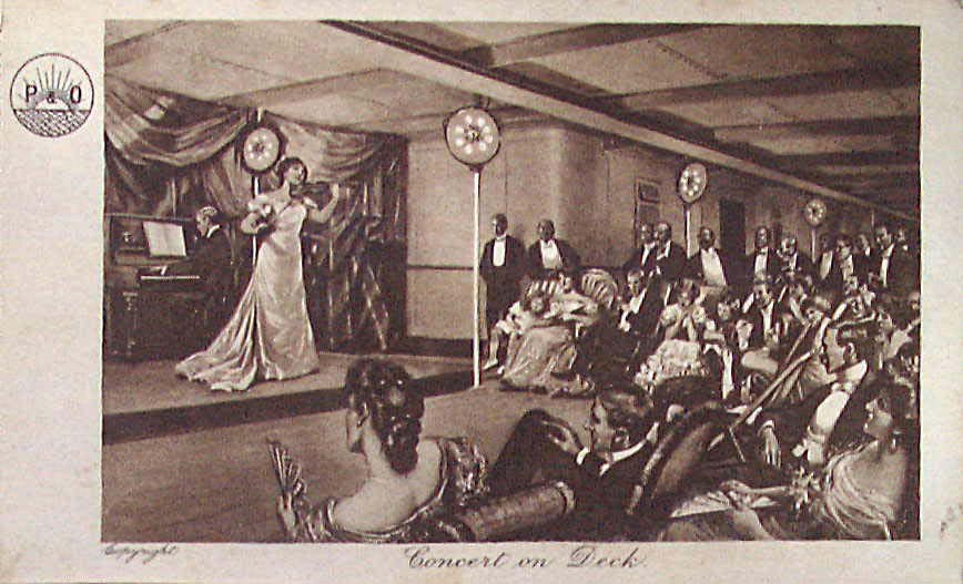'Concert on Deck', from a bound album of postcards published by Peninsular and Oriental Steam Navigation Co., depicting some of the activities engaged in on a voyage east via the Suez Canal, in about 1915.